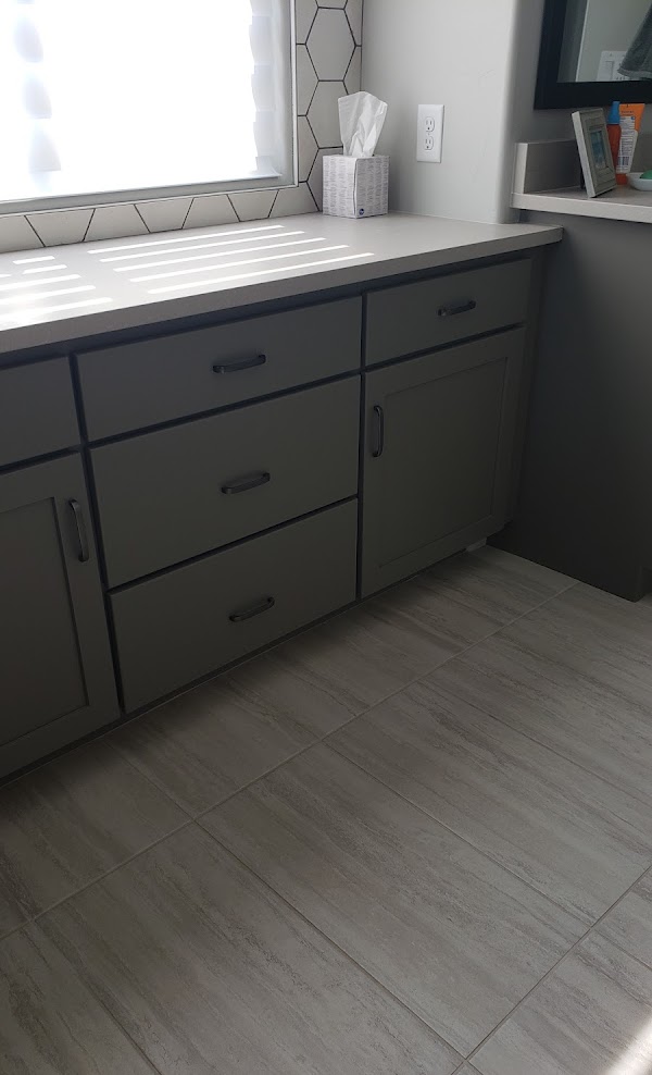 Custom tile flooring installation in bathroom